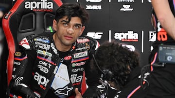Aprilia racing team's Spanish MotoGP rider Jorge Martin looks on during a practice session ahead of the MotoGP Valencia Grand Prix at the Ricardo Tormo racetrack in Cheste on November 14, 2025. (Photo by JAVIER SORIANO / AFP)