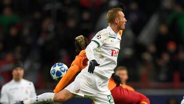 Galatasaray&#039;s Nigerian forward Henry Onyekuru and Lokomotiv Moscow&#039;s Russian midfielder Vladislav Ignatyev vie for the ball during the UEFA Champions League group D football match between FC Lokomotiv Moscow and Galatasaray at the RZD Arena in M