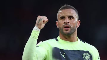 Manchester City's English defender Kyle Walker celebrates on the pitch after the English Premier League football match between Southampton and Manchester City at St Mary's Stadium in Southampton, southern England on April 8, 2023. - City won the game 4-1. (Photo by Adrian DENNIS / AFP) / RESTRICTED TO EDITORIAL USE. No use with unauthorized audio, video, data, fixture lists, club/league logos or 'live' services. Online in-match use limited to 120 images. An additional 40 images may be used in extra time. No video emulation. Social media in-match use limited to 120 images. An additional 40 images may be used in extra time. No use in betting publications, games or single club/league/player publications. /  (Photo by ADRIAN DENNIS/AFP via Getty Images)