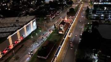 A drone view of the heritage tourist train 'La Sabana', decorated with Christmas lights in Bogota, Colombia, December 15, 2025. REUTERS/Camilo Cohecha