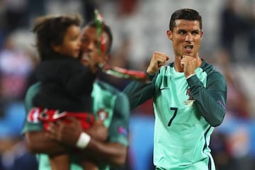 Cristiano, and Nani with daughter, celebrates his team's 1-0 win.