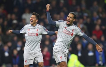 Roberto Firmino and Virgil van Dijk celebrate