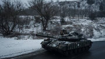 A Ukrainian main battle tank runs on the road near Kupiansk on February 13, 2023, amid the Russian invasion of Ukraine. (Photo by YASUYOSHI CHIBA / AFP) (Photo by YASUYOSHI CHIBA/AFP via Getty Images)