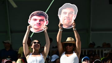 Fans of Red Bull Racing's Dutch driver Max Verstappen and Red Bull Racing's Mexican driver Sergio Perez cheer their team during the qualifying session for the 2024 Miami Formula One Grand Prix at Miami International Autodrome in Miami Gardens, Florida, on May 4, 2024. (Photo by Jim WATSON / AFP)