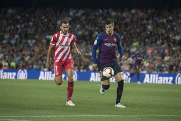 Stuani y Piqué.