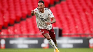 FILE PHOTO: Soccer Football - FA Community Shield - Arsenal v Liverpool - Wembley Stadium, London, Britain - August 29, 2020  Arsenal&#039;s Pierre-Emerick Aubameyang celebrates winning the penalty shootout and winning the FA Community Shield, as play res