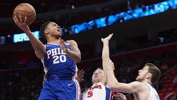 Oct 23, 2017; Detroit, MI, USA; Philadelphia 76ers guard Markelle Fultz (20) shoots over Detroit Pistons guard Luke Kennard (5) and forward Jon Leuer (30) in the second half at Little Caesars Arena. Mandatory Credit: Rick Osentoski-USA TODAY Sports