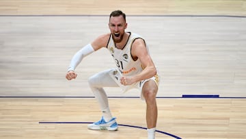 Real Madrid's Dzanan Musa reacts after scoring a basket.