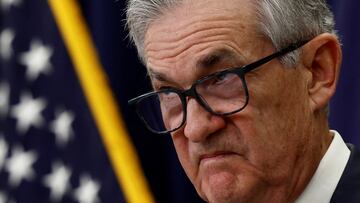 FILE PHOTO: Federal Reserve Board Chairman Jerome Powell looks on during a news conference following the announcement that the Federal Reserve raised interest rates by half a percentage point, at the Federal Reserve Building in Washington, U.S., December 14, 2022. REUTERS/Evelyn Hockstein/File Photo