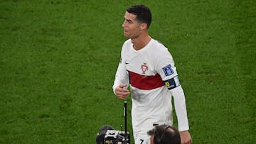 Portugal's forward #07 Cristiano Ronaldo leaves the field after losing to Morocco 1-0 in the Qatar 2022 World Cup quarter-final football match between Morocco and Portugal at the Al-Thumama Stadium in Doha on December 10, 2022. (Photo by NELSON ALMEIDA / AFP)