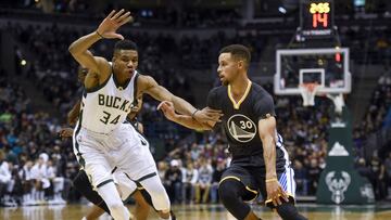 Nov 19, 2016; Milwaukee, WI, USA; Golden State Warriors guard Stephen Curry (30) drives to the basket against Milwaukee Bucks forward Giannis Antetokounmpo (34) in the first quarter at BMO Harris Bradley Center. Mandatory Credit: Benny Sieu-USA TODAY Sports