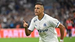 Marseille's Chilean forward Alexis Sanchez celebrates scoring his team's first goal during the French L1 football match between Olympique Marseille (OM) and Lille LOSC at Stade Velodrome in Marseille, southern France on September 10, 2022. (Photo by Christophe SIMON / AFP)