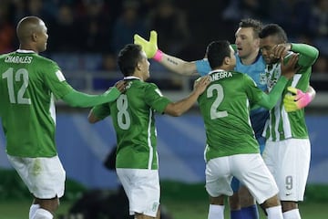 Atletico Nacional's players celebrate after winning the penalty shoot.