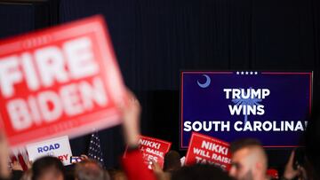 A screen displays "Trump wins South Carolina" during Republican presidential candidate and former U.S. President Donald Trump's South Carolina Republican presidential primary election night party, in Columbia, South Carolina, U.S. February 24, 2024. REUTERS/Shannon Stapleton