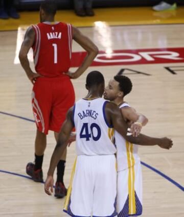 Stephen Curry y Harrison Barnes.