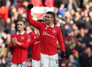 Manchester United beat Manchester City 2-1 at Old Trafford to move within a point of second place in the Premier League.