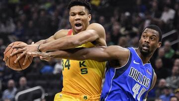 Jan 21, 2019; Milwaukee, WI, USA;  Milwaukee Bucks forward Giannis Antetokounmpo (34) drives for the basket against Dallas Mavericks forward Harrison Barnes (40) in the first quarter at the Fiserv Forum. Mandatory Credit: Benny Sieu-USA TODAY Sports