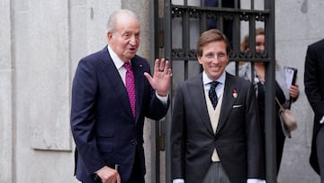 Spain's former King Juan Carlos, who lives in the UAE, waves next to Madrid Mayor Jose Luis Martinez-Almeida on the day of his wedding in Madrid, Spain, April 6, 2024. REUTERS/Ana Beltran