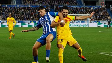 Soccer Football - LaLiga - Deportivo Alaves v FC Barcelona - Estadio Mendizorroza, Vitoria-Gasteiz, Spain - February 3, 2024 FC Barcelona's Ilkay Gundogan in action with Deportivo Alaves' Rafa Marin REUTERS/Vincent West