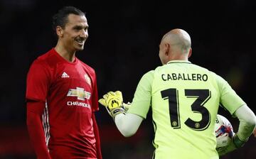 Football Soccer Britain - Manchester United v Manchester City - EFL Cup Fourth Round - Old Trafford - 26/10/16  Manchester United's Zlatan Ibrahimovic with Manchester City's Willy Caballero