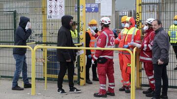 Spectators have their temperature measured as they enter the Via Del Mare Stadium in Lecce, Italy, Sunday, March 1, 2020 prior to the Serie A soccer match between Lecce and Atalanta. (Donato Fasano/LaPresse via AP)