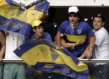 Diego Armando Maradona supporting Boca Juniors at La Bombonera.