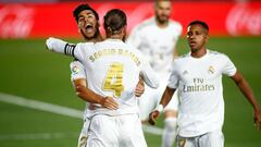 Asensio celebra con Ramos el gol del triunfo al Getafe.