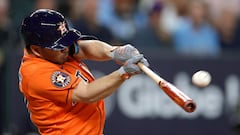 ARLINGTON, TEXAS - OCTOBER 18: Jose Altuve #27 of the Houston Astros hits a solo home run against Max Scherzer #31 of the Texas Rangers during the third inning in Game Three of the American League Championship Series at Globe Life Field on October 18, 2023 in Arlington, Texas.   Carmen Mandato/Getty Images/AFP (Photo by Carmen Mandato / GETTY IMAGES NORTH AMERICA / Getty Images via AFP)