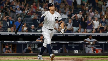 NEW YORK, NY - AUGUST 30: Giancarlo Stanton #27 of the New York Yankees flips the bat after his third-inning, two-run home run against the Detroit Tigers at Yankee Stadium on August 30, 2018 in the Bronx borough of New York City. The home run was Stanton&#039;s 300th in the Major Leagues.   Jim McIsaac/Getty Images/AFP
 == FOR NEWSPAPERS, INTERNET, TELCOS &amp; TELEVISION USE ONLY ==