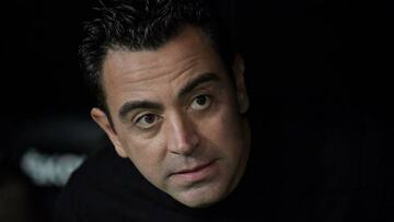 Barcelona's Spanish coach Xavi looks on before the start of the Spanish league football match between Valencia CF and FC Barcelona at the Mestalla stadium in Valencia on October 29, 2022. (Photo by JOSE JORDAN / AFP) (Photo by JOSE JORDAN/AFP via Getty Images)