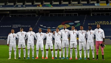 Peru&#039;s players sing their national anthem before the Conmebol Copa America 2021 football tournament semi-final match against Brazil at the Nilton Santos Stadium in Rio de Janeiro, Brazil, on July 5, 2021. (Photo by MAURO PIMENTEL / AFP)