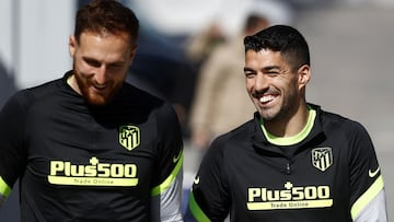 Oblak y Luis Suárez, del Atlético.