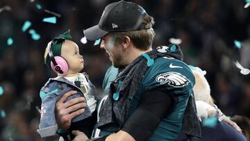 MINNEAPOLIS, MN - FEBRUARY 04:  Nick Foles #9 of the Philadelphia Eagles celebrates with his daughter Lily Foles after his 41-33 victory over the New England Patriots in Super Bowl LII at U.S. Bank Stadium on February 4, 2018 in Minneapolis, Minnesota. The Philadelphia Eagles defeated the New England Patriots 41-33.  (Photo by Rob Carr/Getty Images)