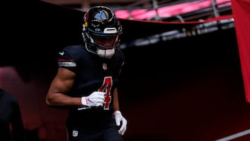 GLENDALE, ARIZONA - NOVEMBER 26: Rondale Moore #4 of the Arizona Cardinals runs onto the field through the locker room tunnel during pregame warmups before an NFL football game against the Los Angeles Rams at State Farm Stadium on November 26, 2023 in Glendale, Arizona. (Photo by Ryan Kang/Getty Images)