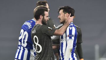 Soccer Football - Europa League - Round of 32 First Leg - Real Sociedad v Manchester United - Allianz Stadium, Turin, Italy - February 18, 2021 Manchester United's Juan Mata with Real Sociedad's David Silva after the match REUTERS/Massimo Pinca