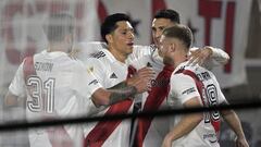 River Plate's forward Matias Suarez (2-R) celebrates with teammates forward Lucas Beltran (R), midfielder Enzo Perez (2-L), and midfielder Santiago Simon after scoring the team's second goal against Platense during the Argentine Professional Football League match at the Monumental stadium in Buenos Aires, on October 12, 2022. (Photo by JUAN MABROMATA / AFP)