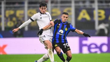 Real Sociedad's French defender #24 Robin Le Normand fights for the ball with Inter Milan's Chilean forward #70 Alexis Sanchez during the UEFA Champions League 1st round day 6 Group D football match between Inter Milan and Real Sociedad at the San Siro stadium in Milan on December 12, 2023. (Photo by Marco BERTORELLO / AFP)