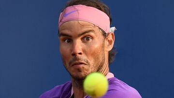 Spain's Rafael Nadal returns the ball to Greece's Stefanos Tsitsipas during the ATP Barcelona Open tennis tournament singles final match at the Real Club de Tenis in Barcelona on April 25, 2021. (Photo by Josep LAGO / AFP)