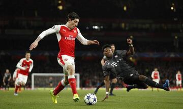 Arsenal's Hector Bellerin in action with Bayern Munich's David Alaba