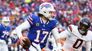 ORCHARD PARK, NEW YORK - JANUARY 12: Josh Allen #17 of the Buffalo Bills carries the ball against the Denver Broncos in the second quarter during the AFC Wild Card Playoffs at Highmark Stadium on January 12, 2025 in Orchard Park, New York. Timothy T Ludwig/Getty Images/AFP (Photo by Timothy T Ludwig / GETTY IMAGES NORTH AMERICA / Getty Images via AFP)