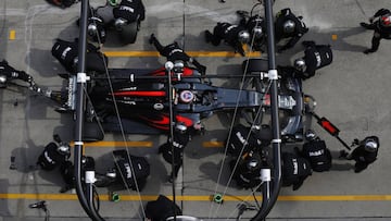 Jenson Button makes a pitstop.