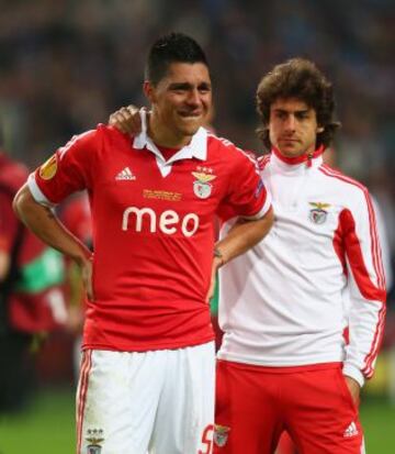 Enzo Perez y Pablo Aymar desolados tras perder el encuentro.