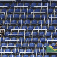 Olympics kicks off to empty seats as organisers left red faced