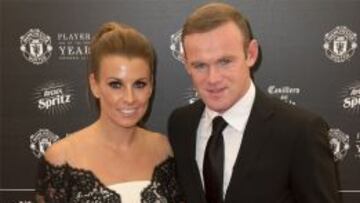 Rooney junto a su esposa Coleen