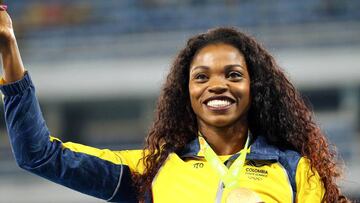 2016 Rio Olympics - Athletics - Victory Ceremony - Women&#039;s Triple Jump Victory Ceremony - Olympic Stadium - Rio de Janeiro, Brazil - 15/08/2016. Gold medalist Caterine Ibarguen (COL) of Colombia reacts after receiving her medal.    REUTERS/Leonhard Foeger FOR EDITORIAL USE ONLY. NOT FOR SALE FOR MARKETING OR ADVERTISING CAMPAIGNS.  