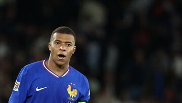France's forward #10 Kylian Mbappe reacts after his team lost the UEFA Nations League Group A2 football match between France and Italy at the Parc des Princes in Paris on September 6, 2024. (Photo by Franck FIFE / AFP)