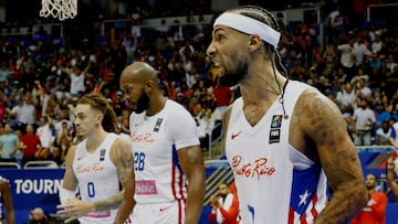 AME9370. SAN JUAN (PUERTO RICO), 04/07/2024.- Jose Alvarado de Puerto Rico celebra durante un partido ante Italia, este jueves durante el Torneo de Clasificación Olímpica FIBA en el Coliseo Jose Miguel Agrelot, en San José (Costa Rica). EFE/ Thais Llorca