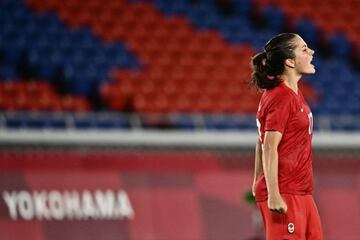 Canada's midfielder Jessie Fleming reacts after converting a penalty during the penalty shoot-out of the Tokyo 2020 Olympic Games women's final.