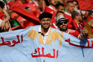 Morocco's fans cheer for their team prior to the 2019 Africa Cup of Nations (CAN) Round of 16 football match between Morocco and Benin at the Al-Salam Stadium in the Egyptian capital Cairo on July 5, 2019. 