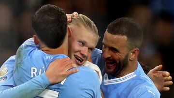 Soccer Football - Premier League - Manchester City v Brentford - Etihad Stadium, Manchester, Britain - February 20, 2024 Manchester City's Erling Braut Haaland celebrates scoring their first goal with Ruben Dias and Kyle Walker Action Images via Reuters/Lee Smith NO USE WITH UNAUTHORIZED AUDIO, VIDEO, DATA, FIXTURE LISTS, CLUB/LEAGUE LOGOS OR 'LIVE' SERVICES. ONLINE IN-MATCH USE LIMITED TO 45 IMAGES, NO VIDEO EMULATION. NO USE IN BETTING, GAMES OR SINGLE CLUB/LEAGUE/PLAYER PUBLICATIONS.